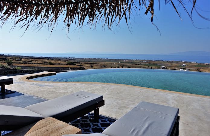 Main pool and Aegean Sea view from Elysian Santorini