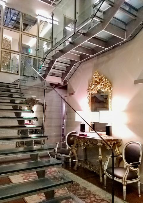 The hotel staircase is a mix of old and new.