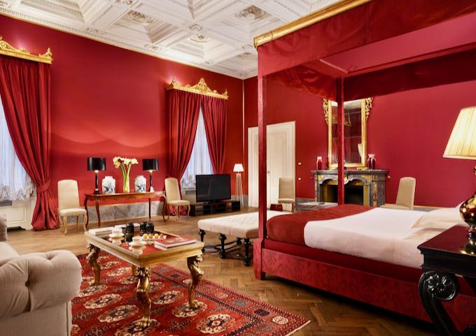 The Baldacchino Rosso Junior Suite King is red and extraordinary.