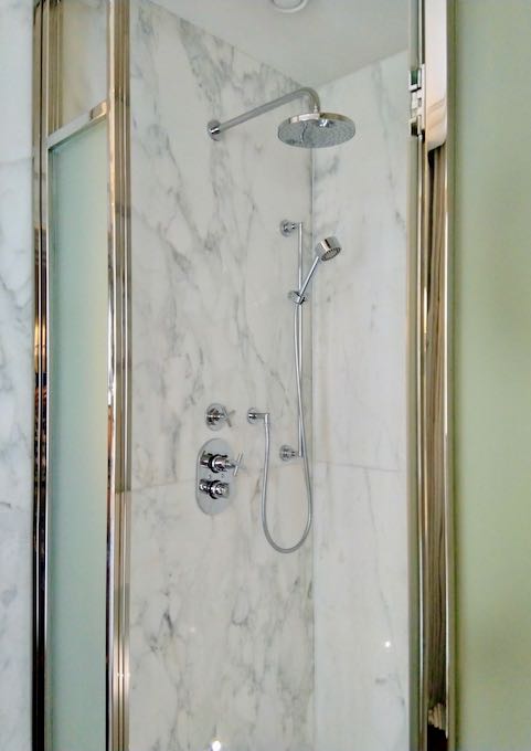The walk-in shower is also in Carrara marble.