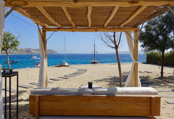 Private, beachfront patio at Bill & Coo Coast Suites at Agios Ioannis