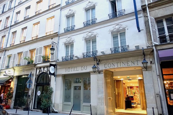 The sidewalk entrance of Hotel du Continent in Paris