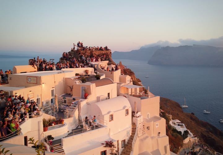 Crowds lined up to watch the sunset in Oia, Santorini