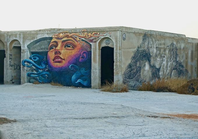 Murals at the hotel ruins at Aliko Beach, Naxos