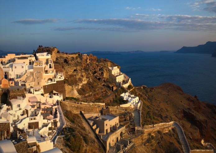 View of Oia castle at sunset on Santorini