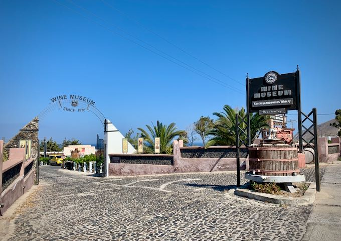 sign and driveway for the Koutsoyannopoulo wine museum in Santorini