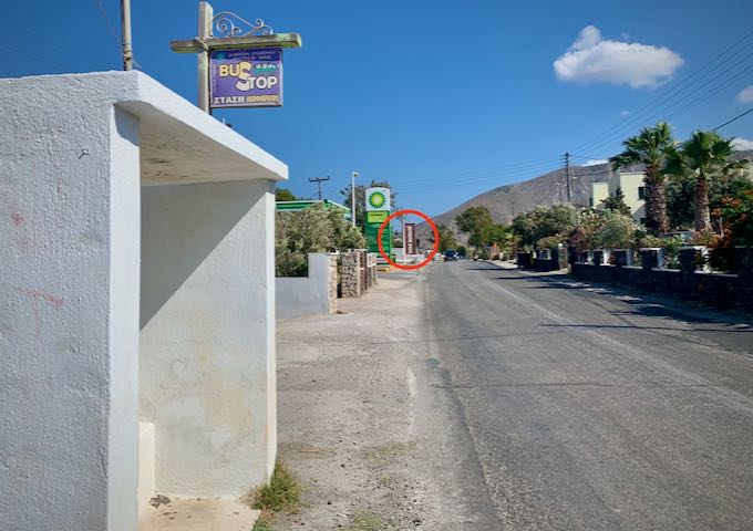 bus shelter on a busy road in Santorini
