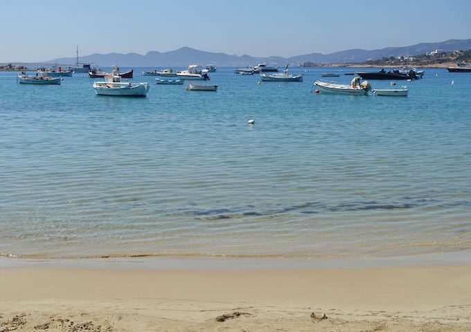 Aliki Beach with fishing boats in Paros, Greece