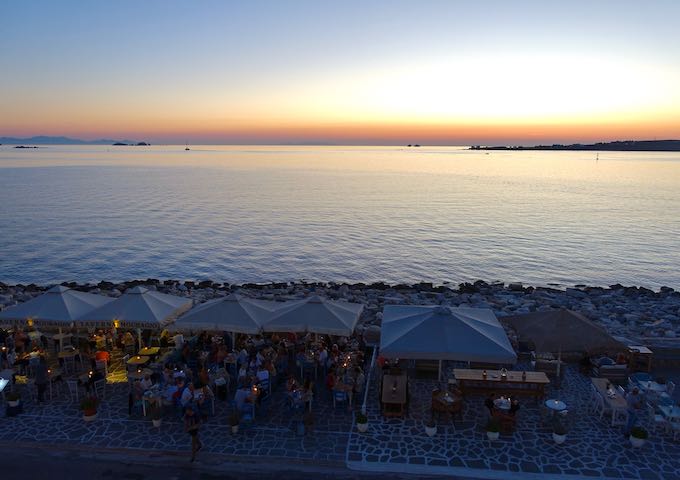 Seaside tavern at sunset in Parikia, Paros