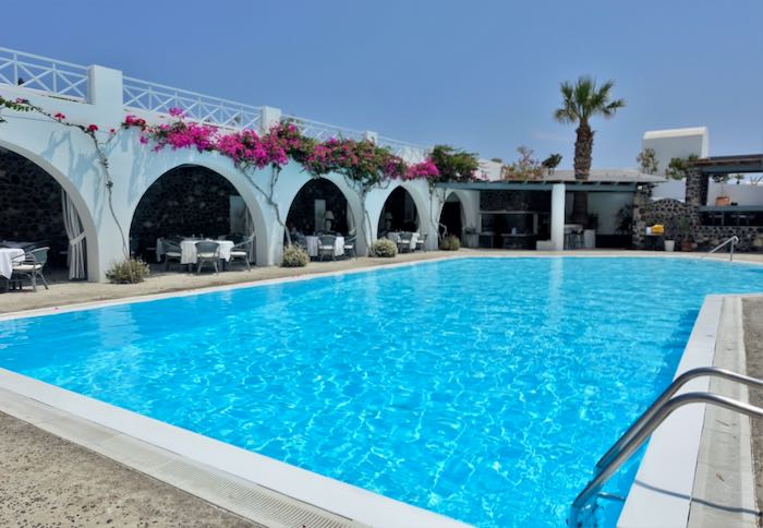 Kamari beach hotel with large pool.