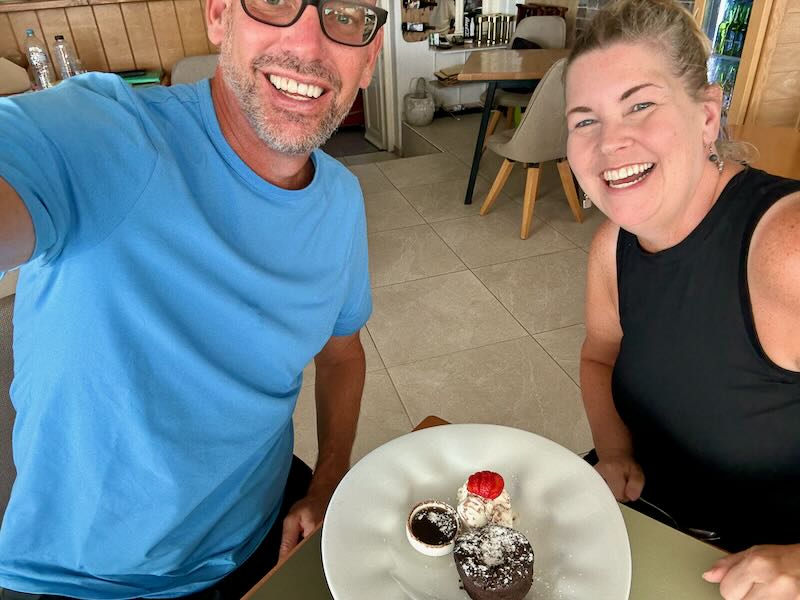 My wife and I at Avocado Restaurant in Imerovigli.