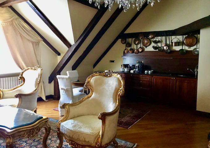Decastello Suite features copperware in the kitchen.