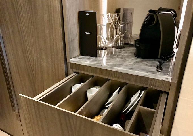 Minibars have basic cutlery, china, and glasses.
