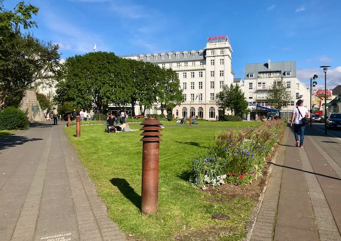 Austurvöllur square is right in front of Apotek.