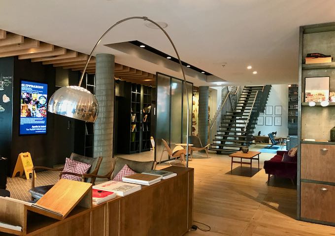 The lobby has a book and vinyl library.