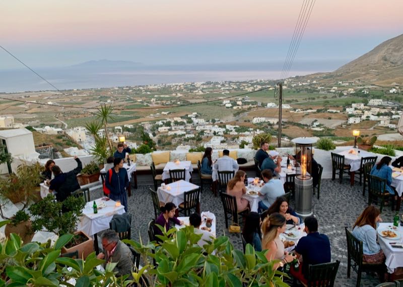 Metaxi Mas restaurant in Santorini at sunset.