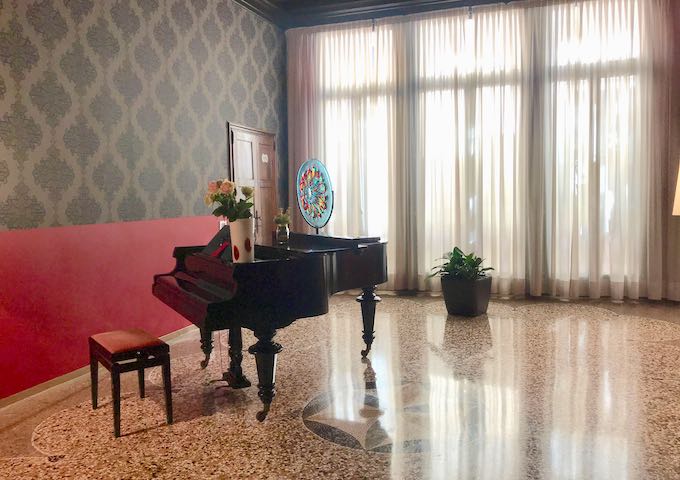 One of the guest lounges has a piano.