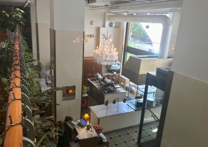 The balcony overlooks the 2 restaurants.