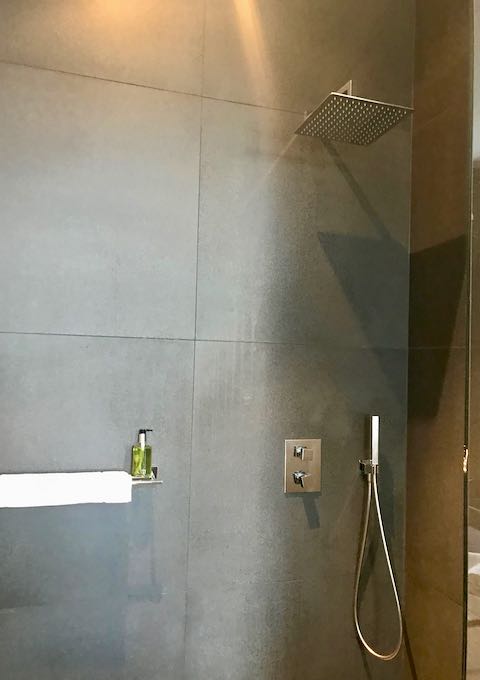 Bathrooms feature rain showers.