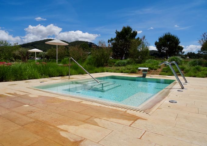 There is a large outdoor hot tub.