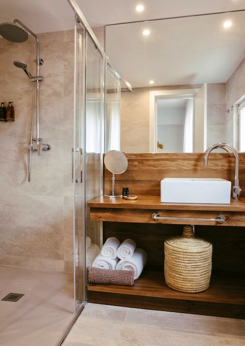 Bathrooms are modern and elegant.