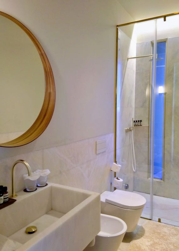 The bathroom is modern and luxurious.