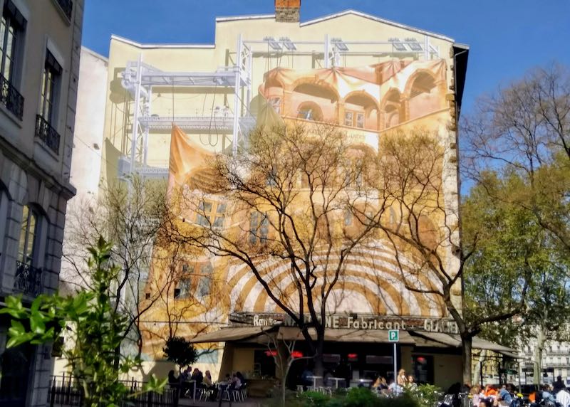 A huge mural is above René Nardone's ice cream parlor.