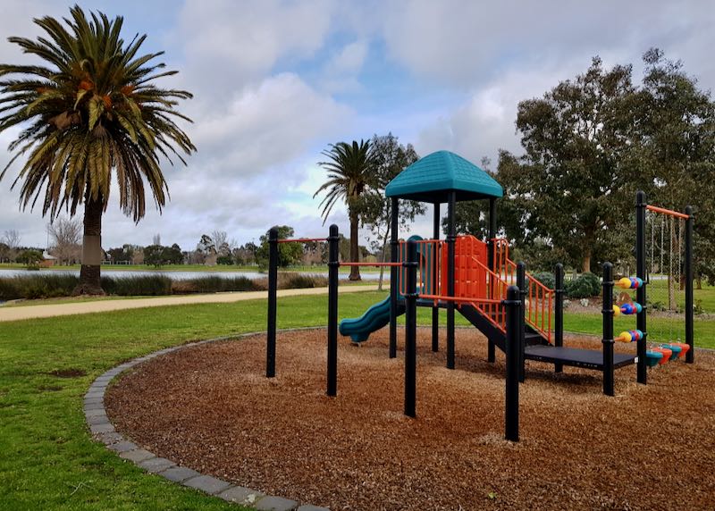 There is a small playground in the park.