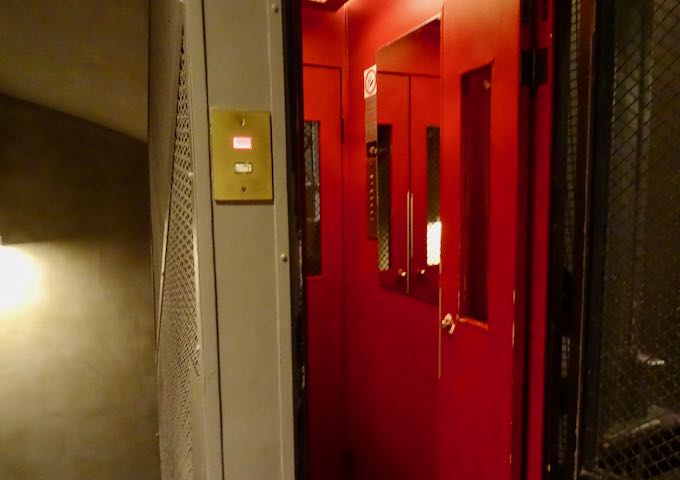The elevator is bright red.