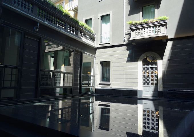The courtyard has a shallow pool.
