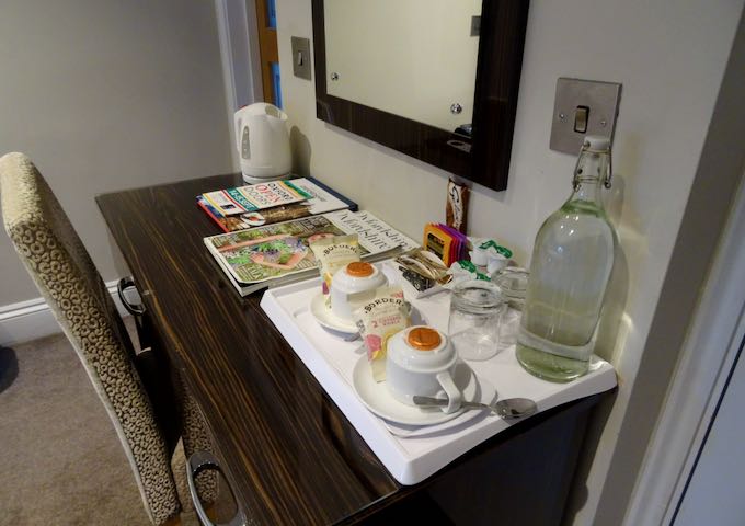 Complimentary water and snacks can be found in each room.