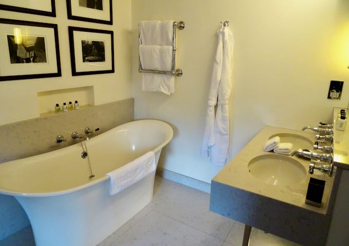 Suites feature bathtubs, dual vanities, and rain showers.