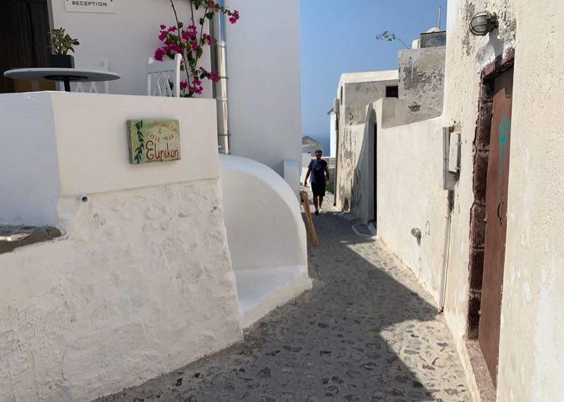 Approach to Rooftop patio with water view at Elinikon restaurant in Oia Santorini