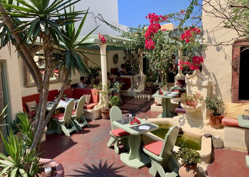 Outdoor patio at at Karma restaurant in Oia