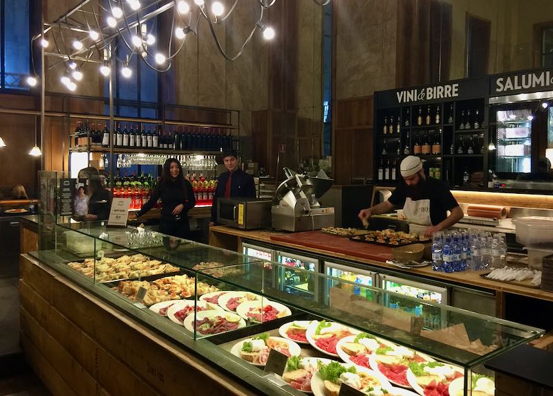 An Italian bistro, with a display of ready-made plates and meals