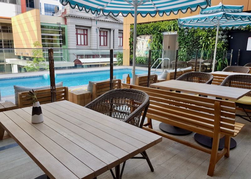 The cafe offers poolside seating.