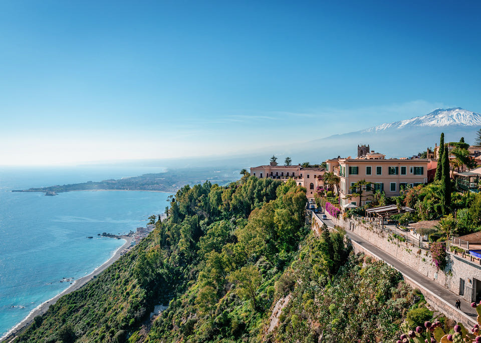 View of Taormina and the Ionian Sea, with Mount Etna in the background