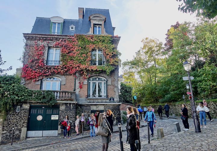 A cobblestone hillside street in Montmartre, Paris