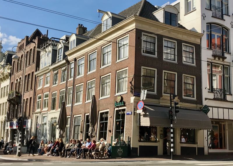 Corner cafe in amsterdam on a sunny day