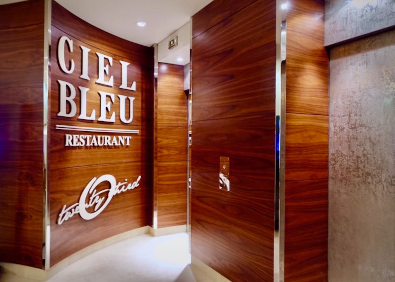Wood-panelled interior entrance to the restaurant Ciel Bleu