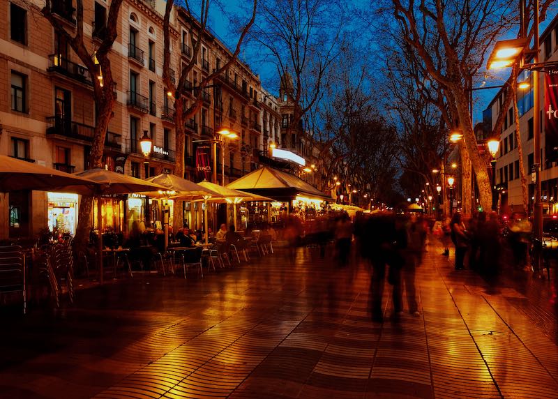 Sidewalk dining at night on La Rambla in Barcelona