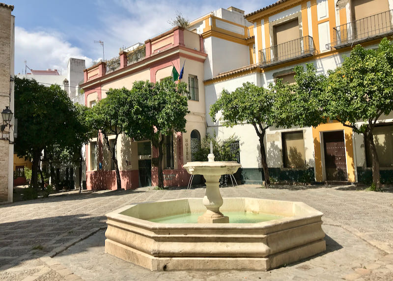 A small plaza is near Real Alcazar.