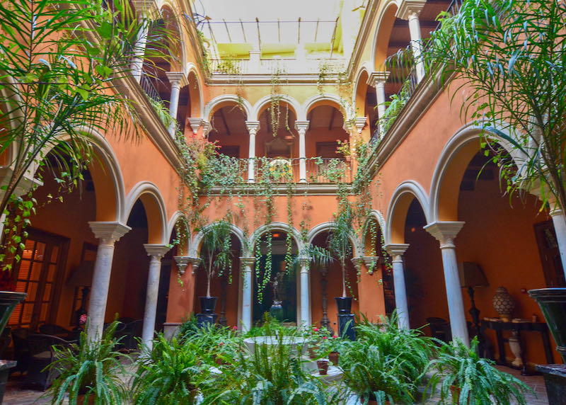 The hotel has a traditional Sevillian inner courtyard.