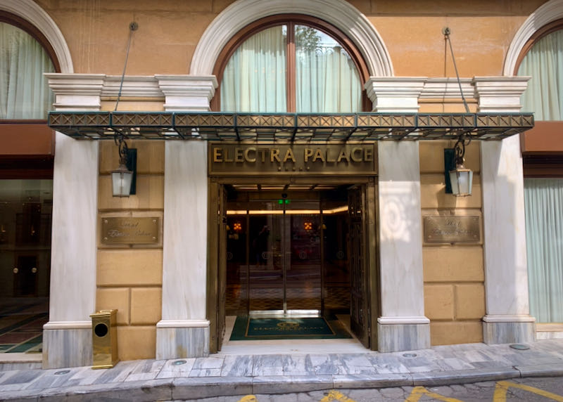 Marble-arched entryway of the Electra Palace Hotel in Athens