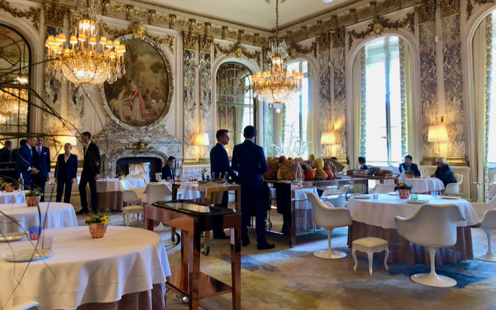 Waiters in an elegant fine-dining restaurant