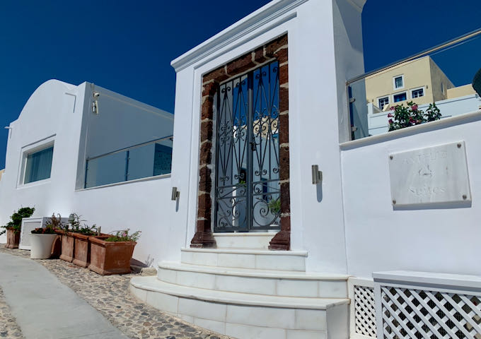 Wrought-iron gate to Anteliz Suites in Santorini