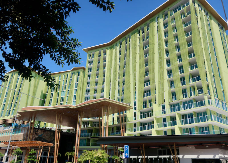 The hotel has a striking green color.