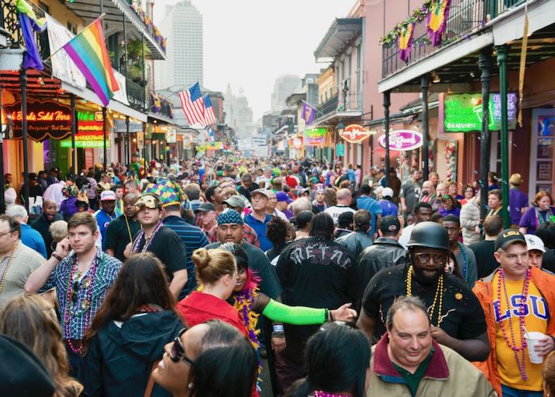 Mardi Gras crowd on Bourbon Street in the French Quarter, New Orleans