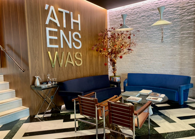 Lobby of AthensWas hotel, with modern leather armchairs and an honesty bar.