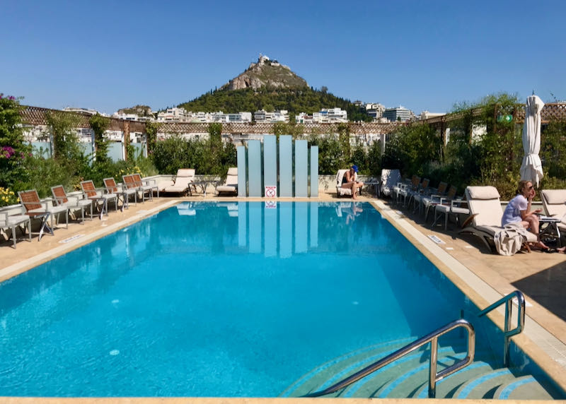 Outdoor pool with view of Lycabettus Hill